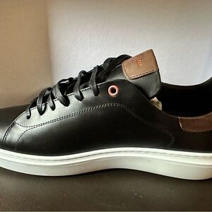 Good Man Brand Black and Brown Sneakers Sleek Leather Design